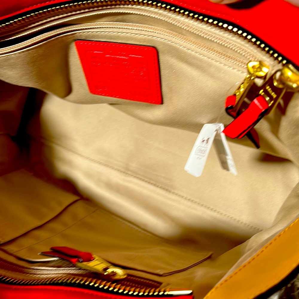 Inside photos of Coach Leather Legacy Colorblock Bag With Tassles. Red/Tan/Navy